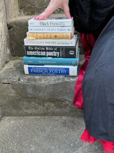 Kait's stack of poetry books